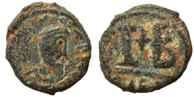 Maurice Tiberius (?), 582-602. 12 Nummi (bronze, 3.13 g, 16 mm), Alexandria. […] IC P P Diademed, draped and cuirassed bust right, holding cross. Rev....