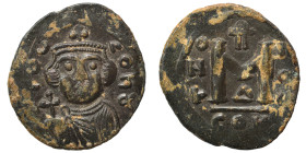 Constans II, 641-668. Follis (bronze, 3.32 g, 22 mm), Possibly an early Arab-Byzantine issue or a contemporary imitation, Uncertain mint. Crowned, bea...