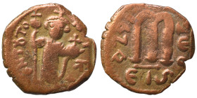 Constans II, 641-668. Follis (bronze, 4.58 g, 22 mm), Constantinople. EN T૪TO NIKA Constans II standing facing, wearing crown surmounted by cross, hol...