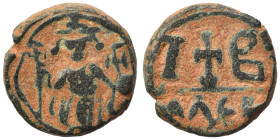 Constans II, 641-668. 12 Nummi (bronze, 7.03 g, 18 mm), Alexandria. Constans II standing facing, wearing crown surmounted by cross, holding long cross...