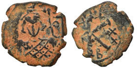 Justinian II, Second Reign, 705-711. Half Follis (bronze, 4.44 g, 27 mm), Constantinople. Facing bust with short beard, wearing crown and loros, holdi...