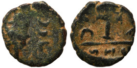 Migration period, uncertain. Nummus (bronze, 0.47 g, 9 mm). Bust right. Rev. Cross, legend around. Good fine.