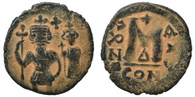 Arab-Byzantine, Umayyad Caliphate, 636-660. Fals (bronze, 2.93 g, 20 mm). Imitation of a Follis of Heraclius, 610-641. Heraclius, to left, Heraclius C...