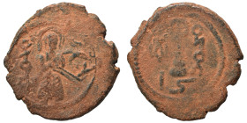 Arab Byzantine. Umayyad Caliphate. al-Malik ibn Marwan, AH 65-86 / 685-705 AD. Fals (bronze, 3.76 g, 21 mm), 'Standing Caliph' type. Caliph standing f...