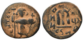 Arab Byzantine. Umayyad Caliphate, circa AD 641-660. Fals (bronze, 4.26 g, 21 mm). Pseudo-Byzantine type, imitating the types of Constans II. Standing...
