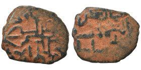 MENKUJAKIDS. Sulayman b. Ishaq, 1181. Fals (bronze, 2.50 g, 18 mm). Islamic legend, citing the Khaqanid ruler Akhsatan I. Rev. Ornamental cross , with...