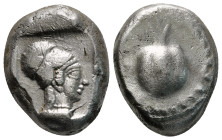 PAMPHYLIA. Side. Stater (Circa 460-430 BC).
Rev: Pomegranate; to upper right, lion head left.
Obv: Helmeted head of Athena right within incuse square....