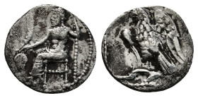 CILICIA. Uncertain. Obol (4th century BC).
Obv: Baaltars seated left, holding grain ear, grapes and sceptre.
Rev: Eagle standing left on Plow.
SNG Fra...