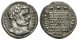 DIOCLETIAN (284-305). Argenteus. Alexandria.
Obv: DIOCLETIANVS AVG.
Laureate head right.
Rev: VIRTVS MILITVM / ALE.
Camp gate, with three towers and o...