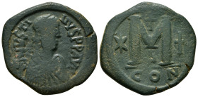 JUSTINIAN I (527-565). Follis. Constantinople.
Obv: D N IVSTINIANVS P P AVG.
Diademed, draped and cuirassed bust right.
Rev: Large M; cross above; sta...