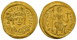 JUSTIN II (565-578). GOLD Solidus. Constantinople. Leight weight issue of 22 Siliquae.
Obv: D N IVSTINVS P P AVG.
Helmeted and cuirassed bust facing...