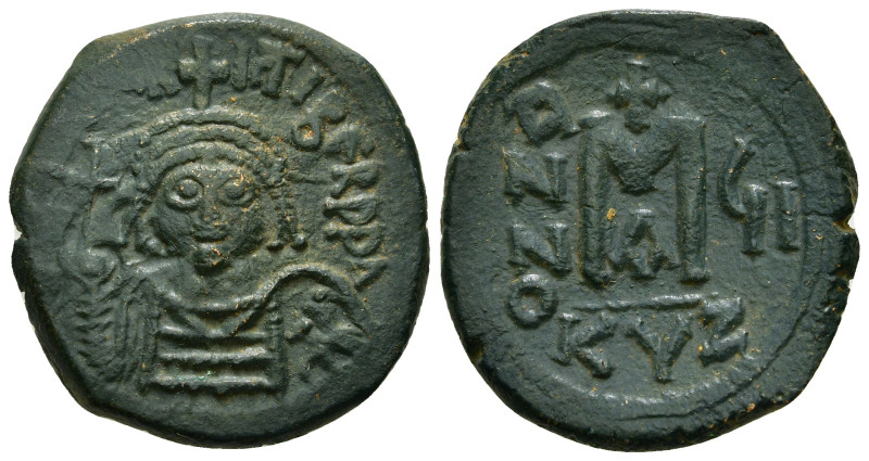 MAURICE TIBERIUS (582-602). Follis. Kyzikos.
Obv: D N mAVRI TIbER P.
Helmeted an...