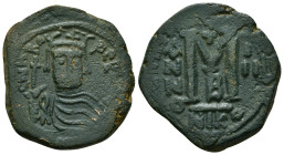 HERACLIUS ( 610-641). Follis. Nicomedia.
Obv: Helmeted, draped and cuirassed bust facing, holding globus cruciger and shield.
Rev: Large M between A/N...