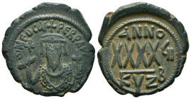 PHOCAS (602-610). Follis. Kyzikos.
Obv: D N FOCAS PERP AVC.
Crowned bust facing, wearing consular robes and holding mappa and cross; small cross in fi...