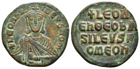 LEO VI THE WISE (886-912). Follis. Constantinople.
Obv: + LЄOҺ ЬASILЄVS ROM'.
Crowned facing bust, holding akakia.
Rev: + LЄOҺ / ЄҺ ӨЄO ЬA / SILЄVS R ...