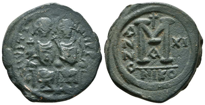 JUSTIN II (565-578). Follis. Nicomedia. Dated RY 9 (573/4).
Obv: D N IVSTINVS P ...