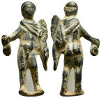 Bronze statuette of Hermes standing nude with cloak thrown over the left shoulder and wearing a winged hat; to his right hand a money bag. (27,28 g - ...