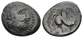 Middle Danube. Uncertain tribe. BL Tetradrachm, 7.88 g 22.59 mm. 2nd-1st centuries BC. imitating Philip II of Macedon. 
Obv:Celticized laureate head o...