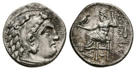 Kings of Macedon. Alexander III 'the Great', AR Drachm, 4.33 g 18.18 mm. 336-323 BC. Kolophon.
Obv: Head of Herakles right, wearing lion skin.
Rev: AΛ...