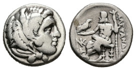 Kings of Macedon. Alexander III 'the Great'. AR Drachm, 4.05 g 16.66 mm. 336-323 BC. Sardes.
Obv: Head of Herakles right, wearing lion skin.
Rev: AΛEΞ...