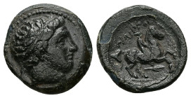 Kings of Macedon. Philip II. AE, 5.21 g 18.63 mm. 359-336 BC.
Obv: Diademed head of Apollo right.
Rev: ΦIΛIΠΠOY, Youth on horseback right. spear-head ...