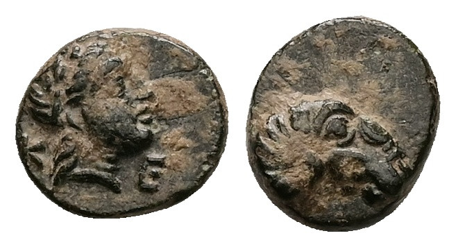 Troas, Kebren. Ae. 1.08 g 9.94 mm. Circa 400-387 BC.
Obv: K E, Head of female ri...