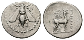 Ionia, Ephesos. AR Drachm, 4.15 g 19.96 mm. Circa 202-150 BC. Piralion, magistrate.
Obv: E - Φ. Bee.
Rev: ΠYPPAΛIΩN. Stag standing right before palm t...