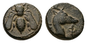 Ionia, Ephesos. Ae, 1.30 g 10.44 mm. Circa 405-390 BC.
Obv: Bee.
Rev: E Φ. Head of stag right.
Ref: SNG Kayhan 147-188; SNG von Aulock -; SNG München ...