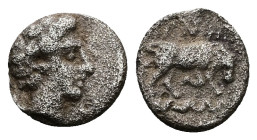 Ionia, Magnesia ad Maeandrum. AR Tetartemorion, 0.16 g 5.94 mm. Circa 400-350 BC.
Obv: Laureate head of Apollo right.
Rev: [MAΓNH]. Bull butting right...