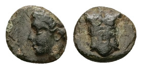 Ionia, Magnesia ad Maeandrum. Ae, 0.50 g 8.37 mm. Circa 400 BC
Obv: Laureate head of Apollo left.
Rev.: Cuirass.
Ref.: SNG Kayhan, 393-94.
Fine/Rare
