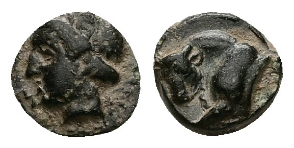 Ionia, Magnesia ad Maeandrum. Ae, 0.54 g 8.31 mm. Circa 400-350 BC.
Obv: Laureat...