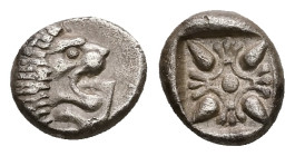 Ionia, Miletos. AR Obol or Hemihekte, 1.11 g 9.80 mm. Late 6th-early 5th century BC.
Obv: Forepart of lion left, head right.
Rev: Stellate floral desi...