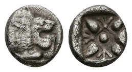 Ionia, Miletos. AR Obol or Hemihekte, 1.14 g 9.35 mm. Late 6th-early 5th century BC.
Obv: Forepart of lion left, head right.
Rev: Stellate floral desi...