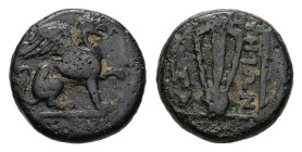 Ionia, Teos. Ae, 1.79 g 11.51 mm. Circa 210-190 BC. 
Obv: Griffin seated to right, raising forepaw 
Rev: Lyre; THIΩN to right, horse's hoof to left; a...