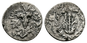 Lydia, Tralleis. Cistophoric Drachm, 3.03 g 16.52 mm. Circa 155-145 BC. 
Obv: ΤΡΑΛ, Grape bunch on vine; to right, torch above lyre. 
Rev: Lion skin d...