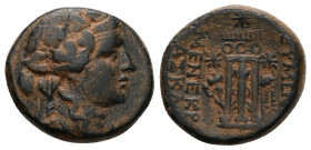 Phrygia, Eumeneia. Circa 133-30 BC.Ae, 9.74 g 22.37 mm. struck under the magistrate Menekrates, son of Askl... 
Obv: Wreathed head of youthful Dionyso...