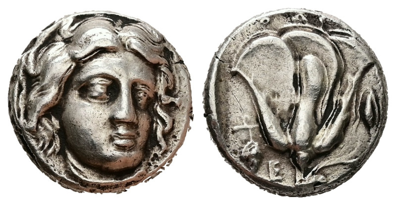 Caria, Rhodes. AR Didrachm, 6.87 g 16.93 mm. Circa 340-316 BC.
Obv: Radiate hea...
