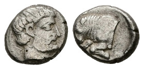 Caria, Uncertain ('Mint E'). AR Diobol, 1.25 g 11.13 mm. Circa 380-340 BC.
Obv: Head of male right, wearing beard
Rev: Forepart of bull left; Carian l...