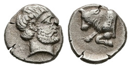 Caria, Uncertain ('Mint E'). AR Diobol, 1.26 g 11.19 mm. Circa 380-340 BC.
Obv: Head of male right, wearing beard
Rev: Forepart of bull left; Carian l...