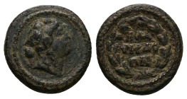 Lydia, Blaundus. Pseudo-autonomous, Time of the Antonines (AD 138-192). AE. 3.08 g. 16.91 mm. 
Obv: Draped bust of Dionysus wearing ivy wreath, right....