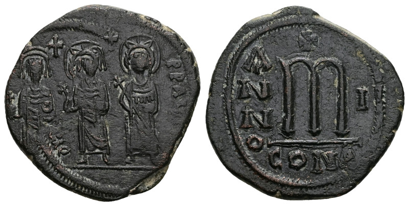 Phocas and Leontia, AD 602-610. AE, Follis. 13.22 g. 32.37 mm. Constantinople.
O...