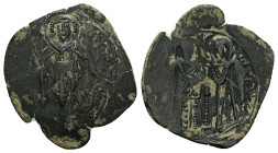 Michael VIII Palaeologus, AD 1261-1282. AE, Trachy. 3.16 g. 28.29 mm. Constantinople.
Obv: St. Demetrius standing facing holding spear in right hand a...
