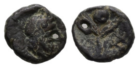 PB Greco-Roman tessera. Phrygia, Ancyra? (AD 1st–3rd centuries)
Obv: Head of Zeus, right.
Rev: Poppy between two grain ears.
The type of poppy betw...