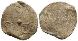 PB Roman tessera (AD 1st – 3th centuries)
Obv: Ivy leaves around central raised pellet.
Rev: Blank.
Weight: 20.48 g.
Diameter: 41.00 mm.