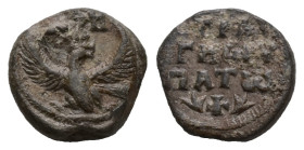 PB Byzantine seal of Strateigos, hypatos (AD 7th century)
Obv: An eagle with its wings outspread. Above, a cruciform invocative monogram (type V): Θεο...