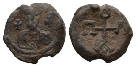 PB Byzantine seal of Paul (AD 6th–7th centuries)
Obv: Bust of a bearded saint between two crosses. Wreath border.
Rev: Cruciform monogram: Παύλου. Wre...
