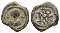 PB Byzantine seal of Komitas (AD 6th–7th centuries)
Obv: Bust of the Virgin holding Christ before her. Crosses on either side. Wreath border.
Rev: Blo...