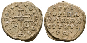 PB Byzantine seal of Gregory, patrikios and strategos (AD 9th century)
Obv: A patriarchal cross (x at lower transverse bar) mounted on a base of three...