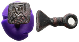 AE Byzantine stamp seal (AD 6th–7th centuries)
A bronze pyramid-shaped stamp seal with suspension ring to the top; engraved to the base, facing figure...