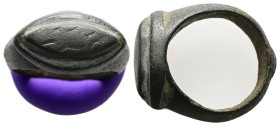 AR Roman finger-ring (c. AD 1st century)
Silver finger-ring; raised almond-shaped bezel.
Weight: 12.97 g.
Diameter: 19.72 mm.